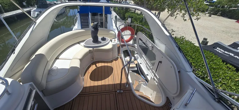  Yacht Photos Pics Luxurious 2012 Meridian 341 Sedan yacht with spacious seating and elegant deck design.