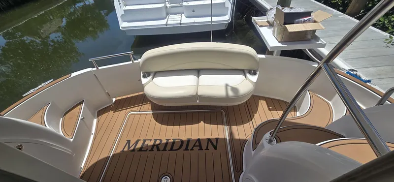  Yacht Photos Pics 2012 Meridian 341 Sedan yacht deck with seating and teak flooring.