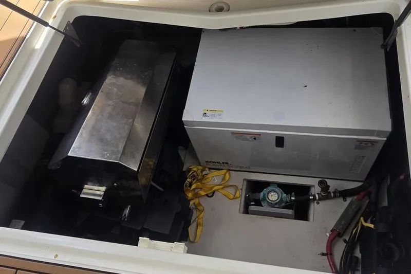  Yacht Photos Pics Engine compartment of a 2012 Meridian 341 Sedan with Kohler generator and equipment.