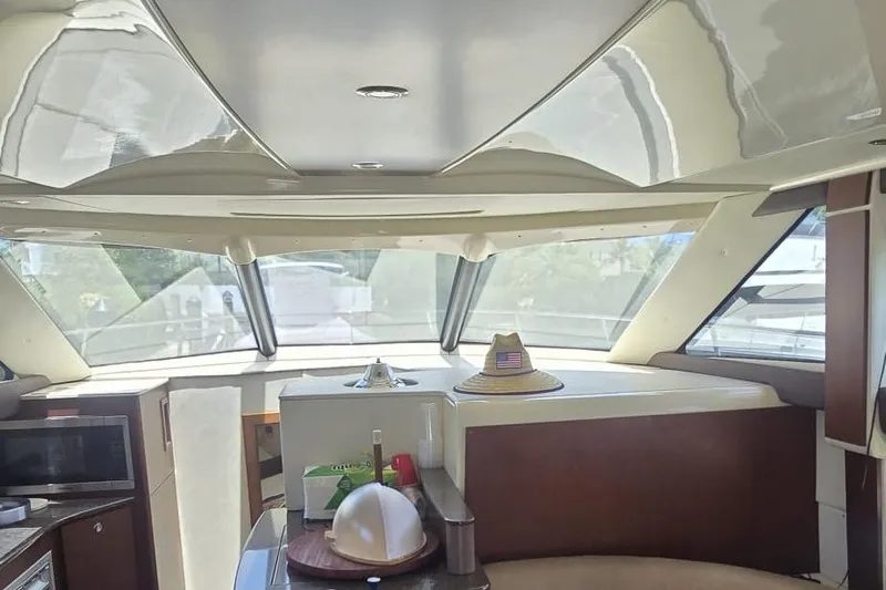  Yacht Photos Pics Interior of a 2012 Meridian 341 Sedan yacht with modern design and large windows.