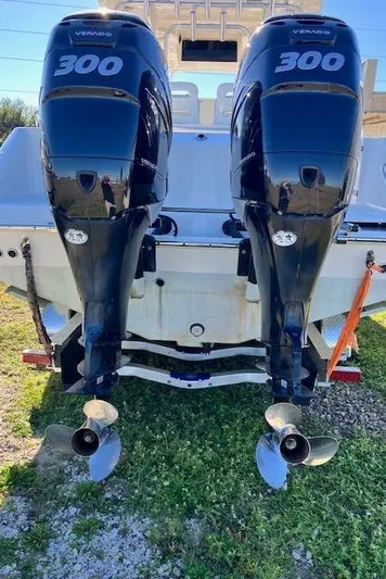  Yacht Photos Pics 2016 Boston Whaler 320 Outrage Cuddy Cabin with twin 300 Verado engines.