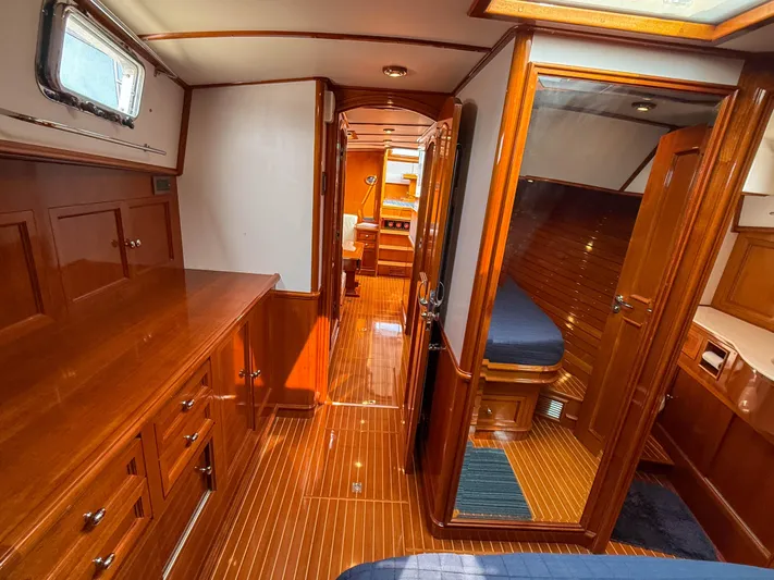 Bira Yacht Photos Pics Luxurious wooden interior of 2006 Grand Banks 49 Eastbay SX yacht cabin.