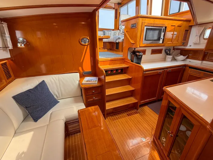 Bira Yacht Photos Pics Luxurious 2006 Grand Banks 49 Eastbay SX yacht interior with wood finish and modern amenities.