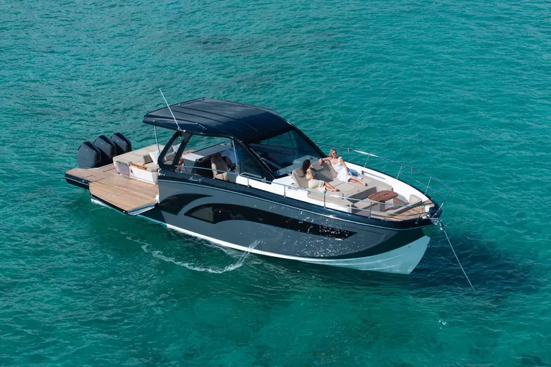  Yacht Photos Pics Luxury Hanover 447 boat cruising on clear turquoise waters, 2026 model.