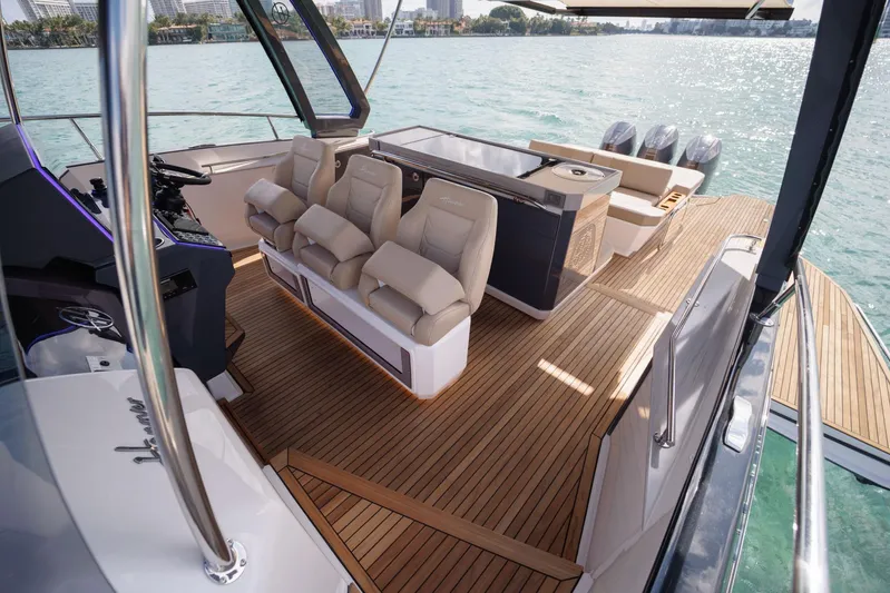  Yacht Photos Pics Luxurious 2026 Hanover 447 yacht interior with plush seating and sleek design on open water.