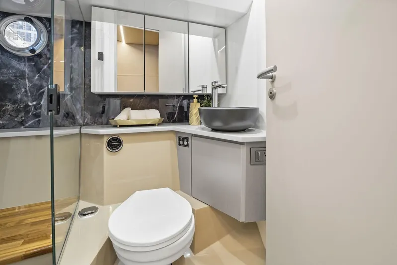  Yacht Photos Pics Modern bathroom interior on Hanover 447 yacht, 2026 model, featuring sleek design and elegant fixtures.