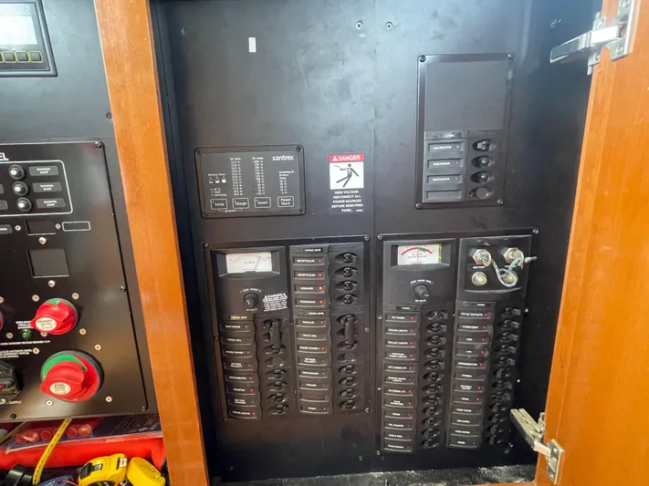 Queen Alexia Yacht Photos Pics Electrical control panel inside a 2005 Meridian 341 Sedan boat.