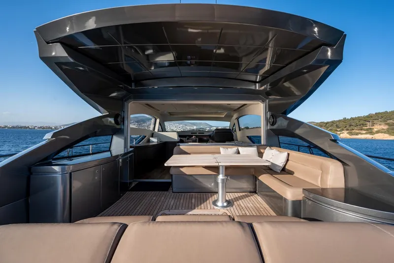 Pax Yacht Photos Pics Luxurious 2008 Pershing 64 yacht interior with elegant seating and ocean view.