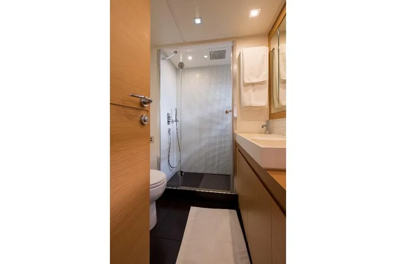 Pax Yacht Photos Pics Luxurious bathroom in 2008 Pershing 64 yacht with modern shower and sleek design.
