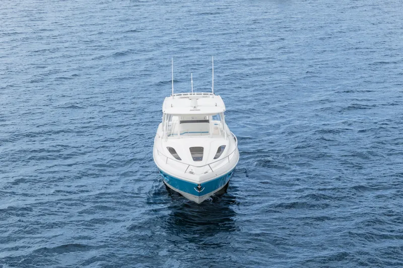  Yacht Photos Pics 2018 Intrepid 407 Cuddy boat on open water, front view.