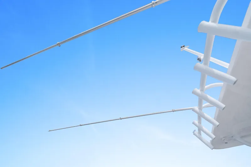  Yacht Photos Pics 2018 Intrepid 407 Cuddy boat outriggers against clear blue sky.