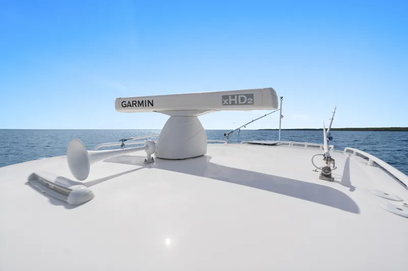  Yacht Photos Pics 2018 Intrepid 407 Cuddy boat with Garmin xHD2 radar on open water.