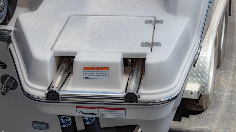  Yacht Photos Pics 2023 Sailfish 316 DC boat swim platform with retractable ladder.