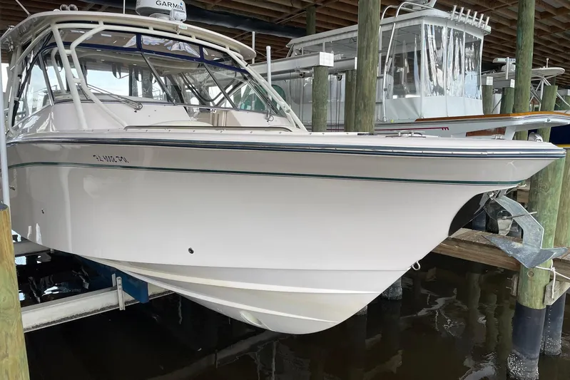  Yacht Photos Pics 2014 Grady-White Freedom 335 boat docked in a marina.