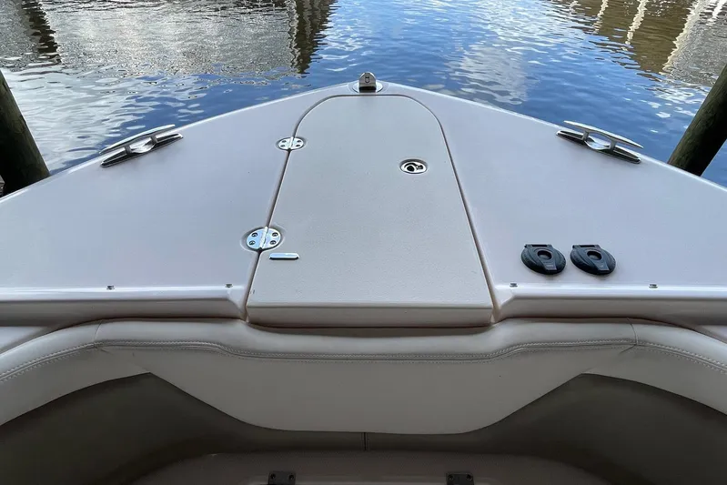  Yacht Photos Pics 2014 Grady-White Freedom 335 boat deck with water reflection in background.