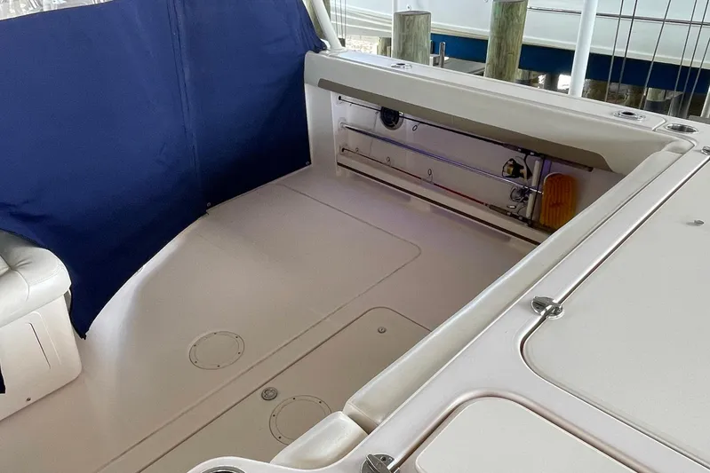  Yacht Photos Pics 2014 Grady-White Freedom 335 boat interior with seating and storage area.