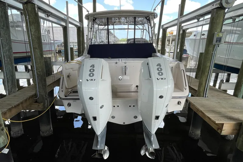  Yacht Photos Pics 2014 Grady-White Freedom 335 boat with twin Mercury 400 V10 engines in dock.