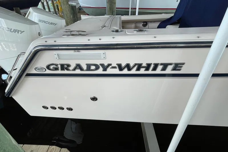 Yacht Photos Pics 2014 Grady-White Freedom 335 boat docked with visible branding.