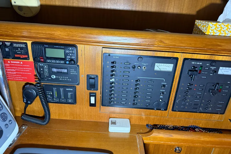 Wind D Yacht Photos Pics Control panel of a 2005 Hunter 46LE yacht with communication and monitoring systems.