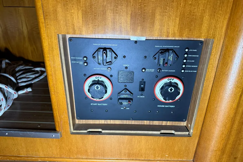 Wind D Yacht Photos Pics Control panel of a 2005 Hunter 46LE yacht, featuring battery switches and indicators.