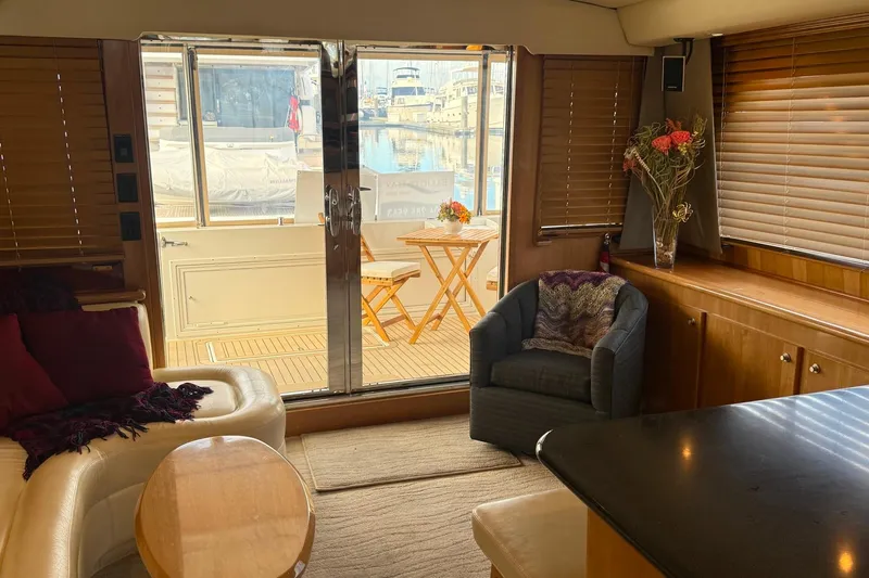  Yacht Photos Pics Luxurious 2007 Navigator 51 yacht interior with cozy seating and elegant decor.