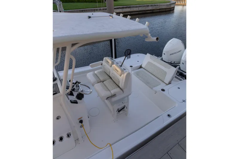  Yacht Photos Pics 2022 Caymas 28 HB Twin boat interior with seating and Mercury engines.