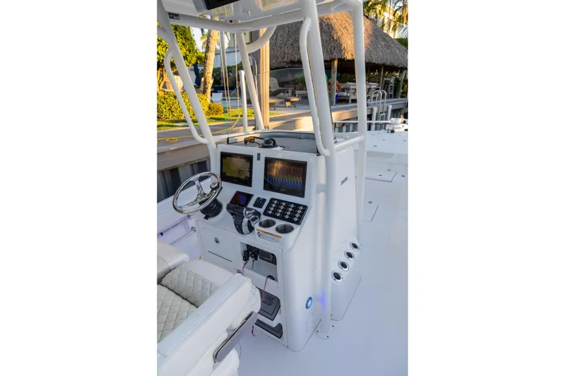  Yacht Photos Pics 2022 Caymas 28 HB Twin boat console with advanced navigation displays and controls.