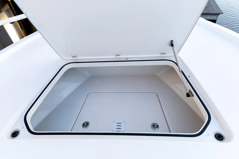  Yacht Photos Pics Open storage compartment on 2022 Caymas 28 HB Twin boat.