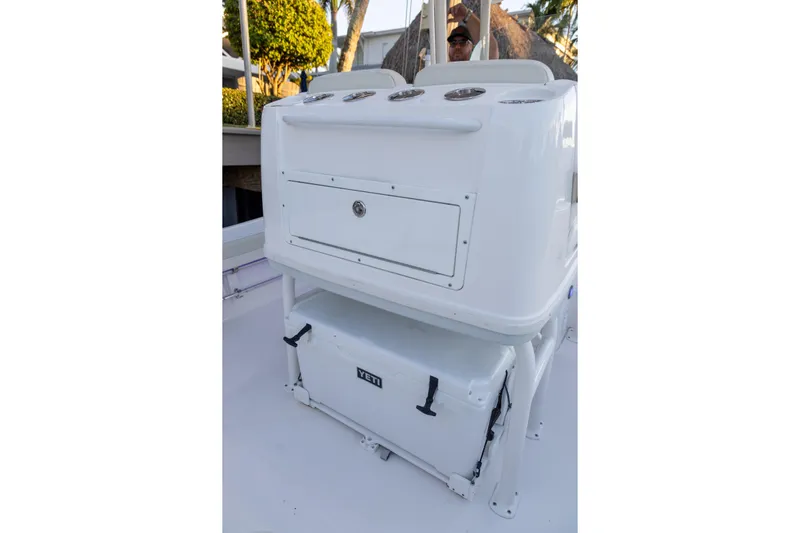  Yacht Photos Pics 2022 Caymas 28 HB Twin boat console with Yeti cooler underneath.