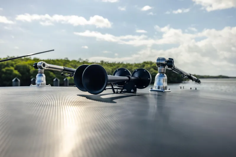  Yacht Photos Pics Close-up of Marlago 35 boat equipment on deck, 2005 model, with scenic water view.