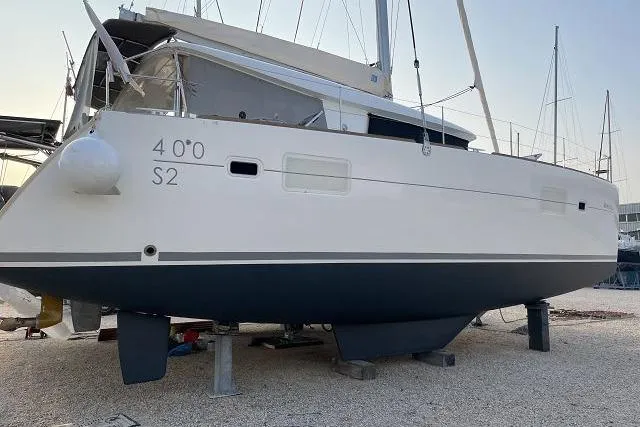 Seafox 1 Yacht Photos Pics 2015 Lagoon 400 S2 catamaran on dry dock, side view.