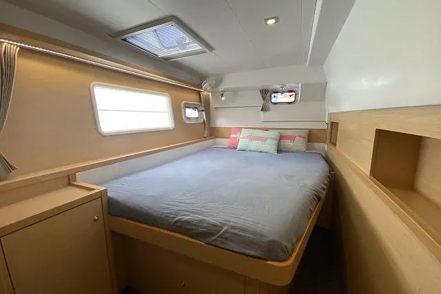 Seafox 1 Yacht Photos Pics 2015 Lagoon 400 S2 yacht cabin with cozy bed and natural light.