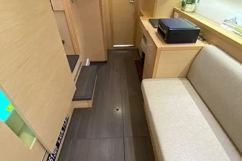 Seafox 1 Yacht Photos Pics Interior of 2015 Lagoon 400 S2 yacht with modern furnishings and wooden flooring.