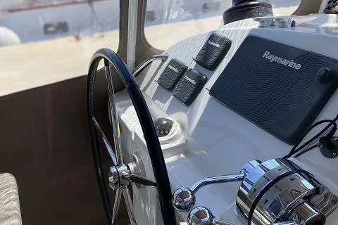 Seafox 1 Yacht Photos Pics Steering wheel and controls of 2015 Lagoon 400 S2 catamaran.