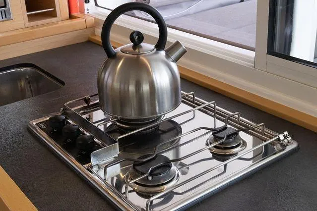Seafox 1 Yacht Photos Pics Stainless steel kettle on a modern stovetop in Lagoon 400 S2, 2015 model.