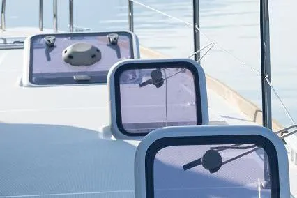 Seafox 1 Yacht Photos Pics 2015 Lagoon 400 S2 yacht deck with hatches and calm water reflection.