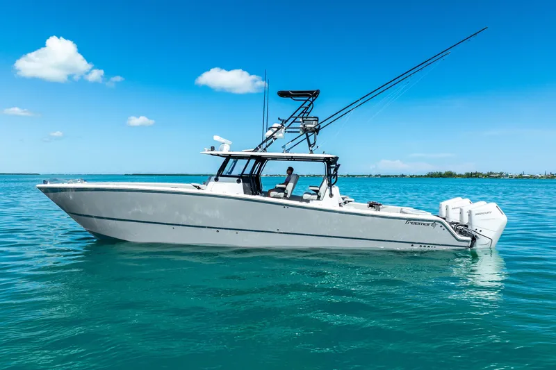  Yacht Photos Pics 2024 Freeman 42 boat on clear blue water under a sunny sky.