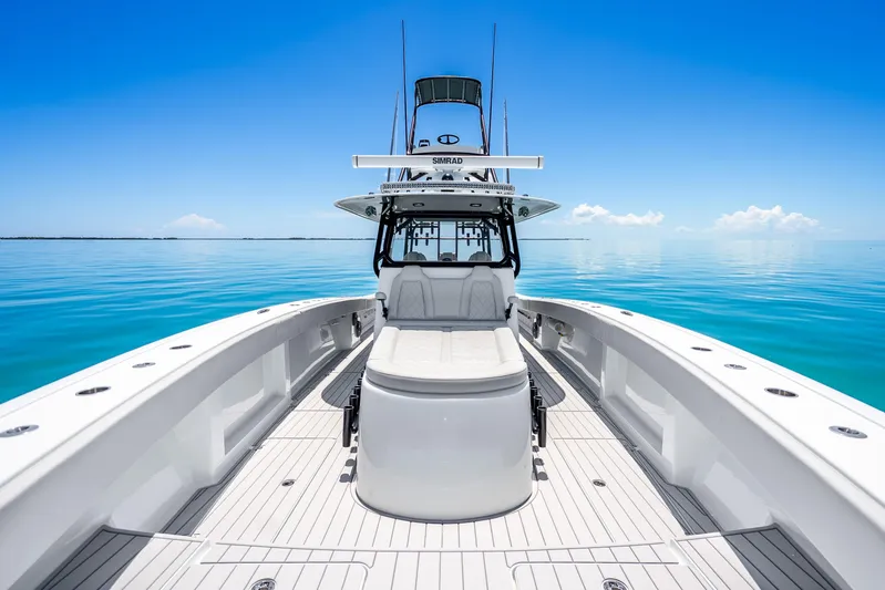 Yacht Photos Pics 2024 Freeman 42 boat on calm blue ocean under clear sky.