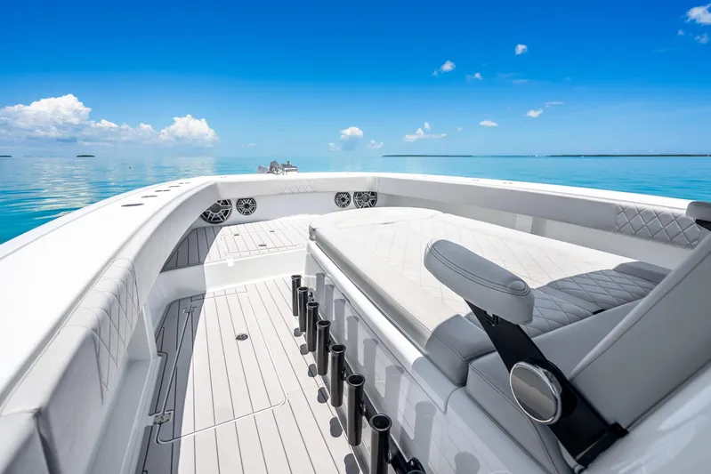  Yacht Photos Pics Luxurious 2024 Freeman 42 boat interior with sleek seating and ocean view.