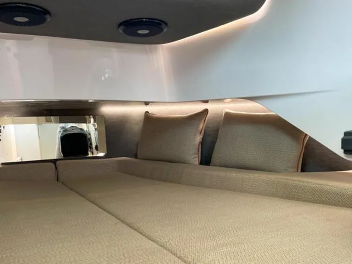  Yacht Photos Pics Interior cabin of 2021 Axopar 37 Sun Top BRABUS Trim with cozy bedding.