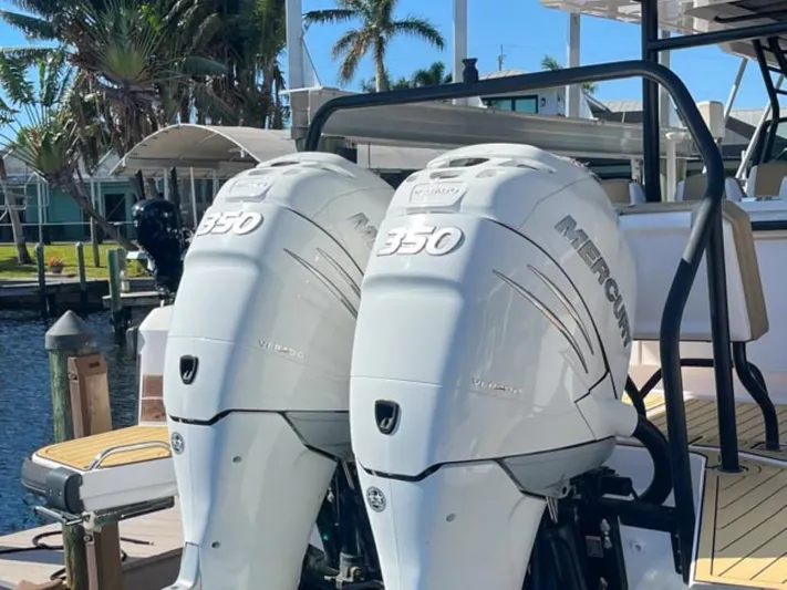  Yacht Photos Pics 2021 Axopar 37 Sun Top BRABUS Trim with twin Mercury 350 engines docked.