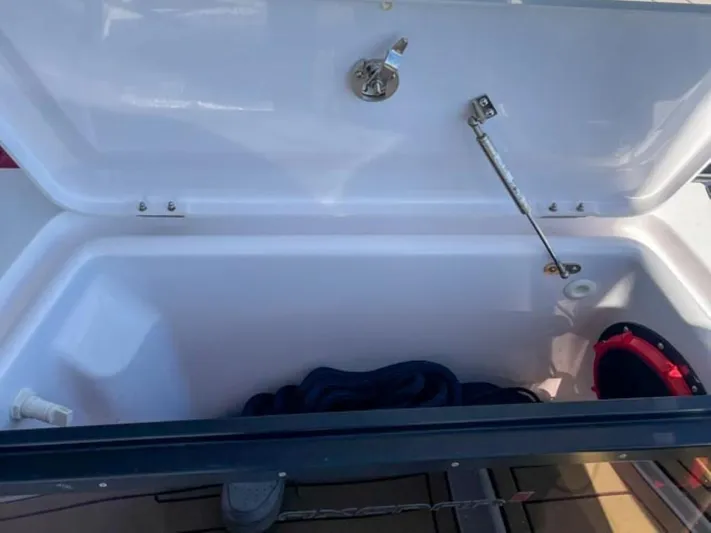  Yacht Photos Pics Open storage compartment on 2021 Axopar 37 Sun Top BRABUS Trim boat.