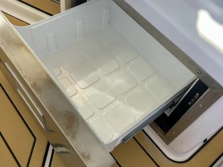  Yacht Photos Pics Open storage compartment on 2021 Axopar 37 Sun Top BRABUS Trim boat.