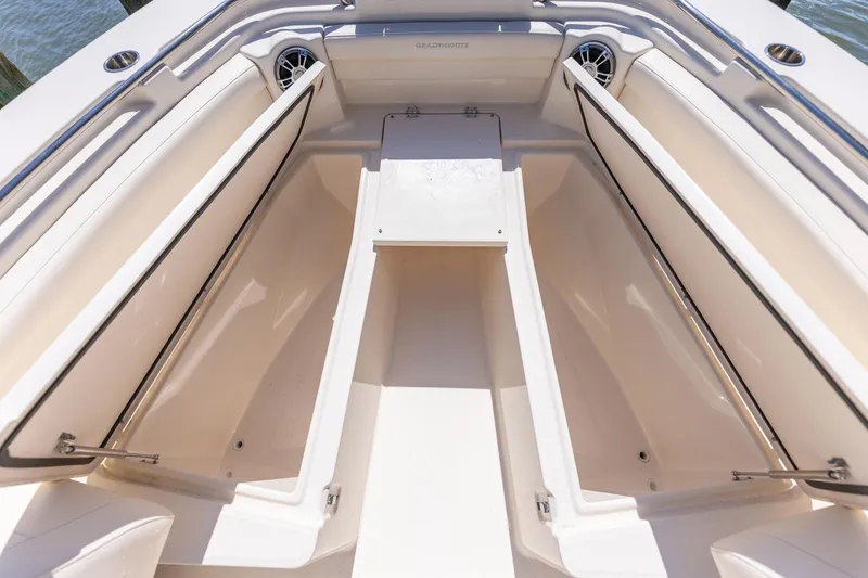  Yacht Photos Pics 2022 Grady-White Canyon 336 boat interior with open storage compartments.