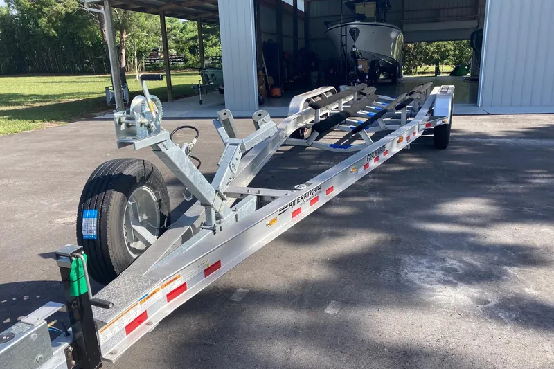  Yacht Photos Pics Trailer for 2022 Grady-White Canyon 336 boat parked outdoors.