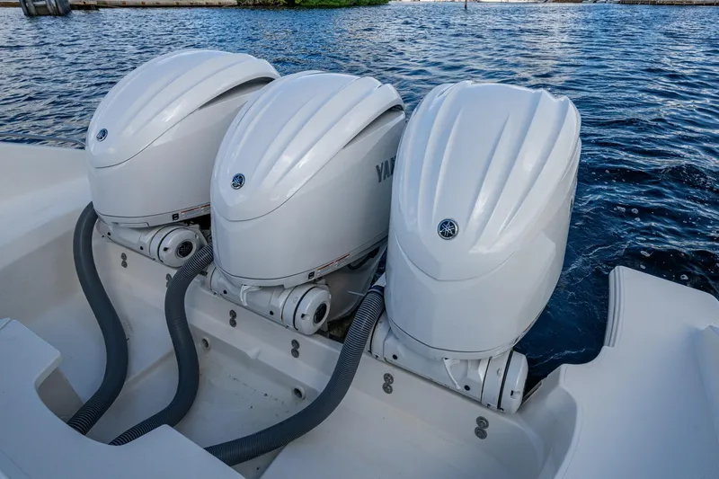  Yacht Photos Pics Triple Yamaha outboard engines on a 2022 Pursuit OS 355 Offshore boat.