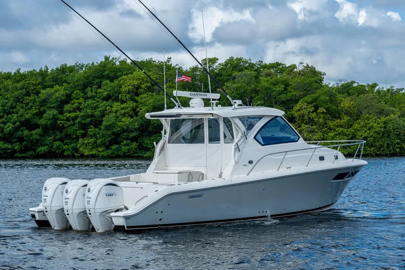  Yacht Photos Pics 2022 Pursuit OS 355 Offshore boat on water, featuring triple Yamaha engines.