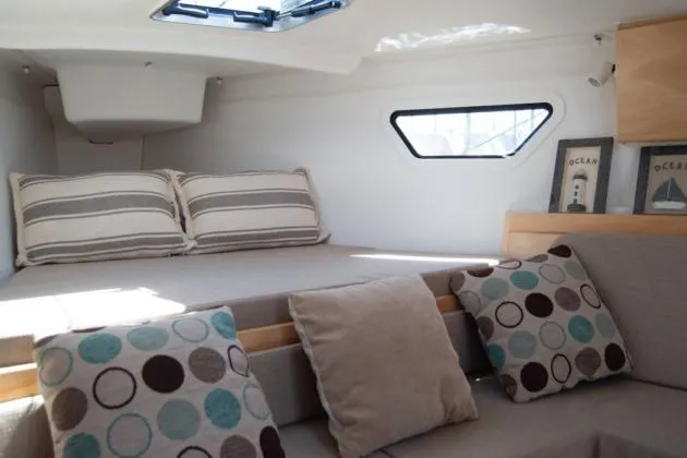 Z28 Yacht Photos Pics Luxurious interior of 2025 Zonda Yachts Z28 with stylish cushions and modern decor.