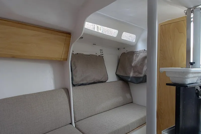 Z28 Yacht Photos Pics Interior of 2025 Zonda Yachts Z28, featuring cozy seating and modern design elements.