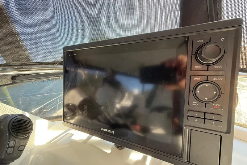 La Vie Dansante Yacht Photos Pics Garmin GPS display on 1991 Californian 55 Cockpit Motor Yacht dashboard.